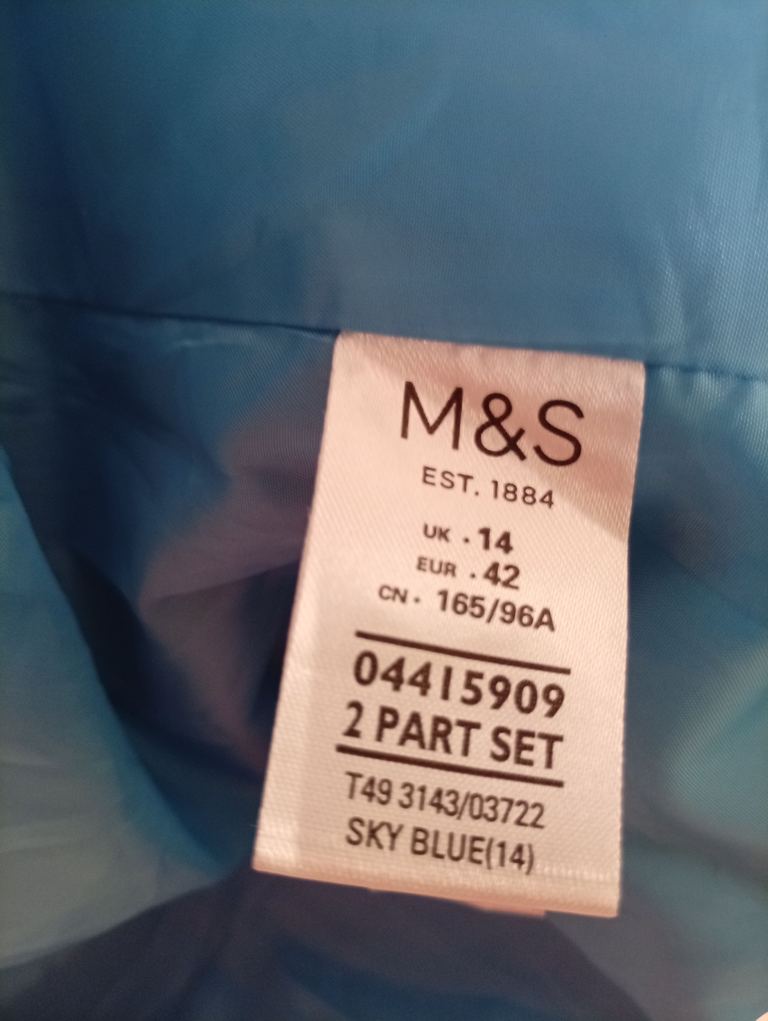 Krátký modrý trenckot M&S